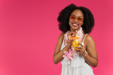 Cheerful millennial black lady student in sunglasses, enjoy beach party, drinking cocktail