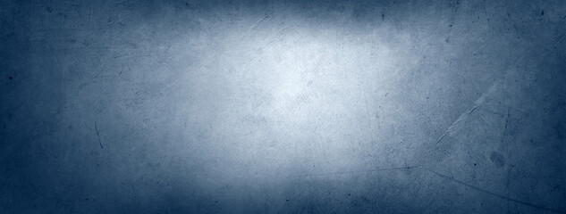Blue textured concrete wall background
. Dark edges