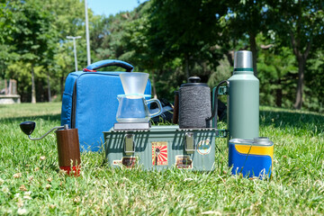 Coffee maker set grinder glass chemex pot coffeemaker on grass. 