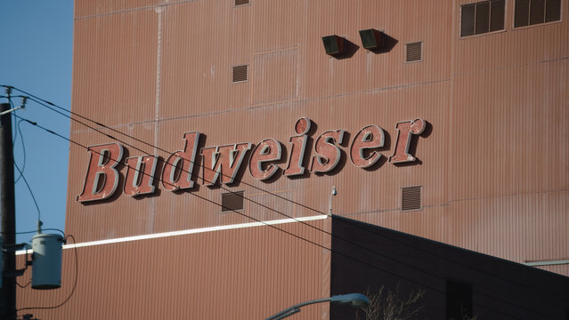 Newark, NJ -  April 1, 2023 : Budweiser brand beer logo on Anheuser-Busch Newark brewery in New Jersey