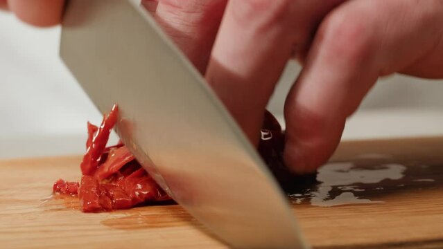 American pastrami sandwich in New York ham meet cuts. chef cooking Famous thick cut sous vide beef sandwich on restaurant cafe kitchen. Bread with curd cheese. Studio shot close up.