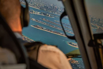 Zelfklevend Fotobehang Dubai Palm Islands photographed from a helicopter. © Tetlak