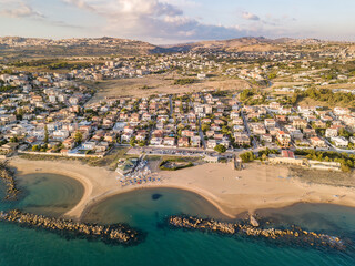 Italian city and coastal beach photographed by drone. Agrigento, Sicily.