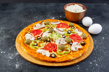 front view tasty mushroom pizza with red tomatoes bell-peppers olives and mushrooms all sliced inside on the dark desk food meal pizza italian