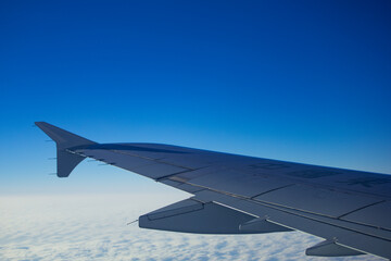 Fototapeta na wymiar Flying - Above the Clouds