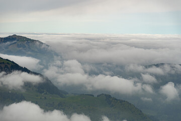 Fototapeta na wymiar Foggy Appenzell area seen from the top of the mount hoher Kasten in Switzerland