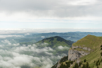 Fototapeta na wymiar Foggy Appenzell area seen from the top of the mount hoher Kasten in Switzerland