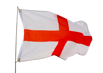 Big flag of England fastened on stick against background of blue sky under daylight