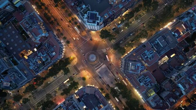 Central areas of Barcelona at night. Top view, filming from a drone.