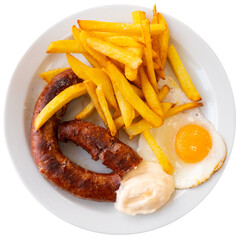 Dish of fried sausages with fried eggs and French fries. Served with sauce. Isolated over white background