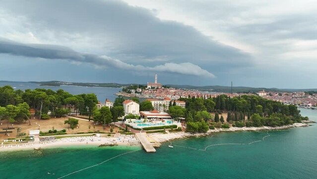 Rovinj, Croatia. Aerial view. Old historic buildings in the bay. Harbour with boats. Beautiful romantic old town of Rovinj during sunset, Istrian peninsula, Croatia, Europe.