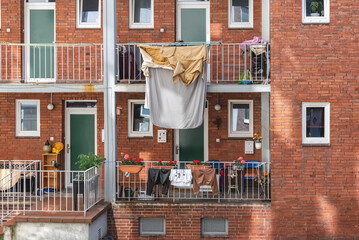 clothes are drying on the balcony in the city