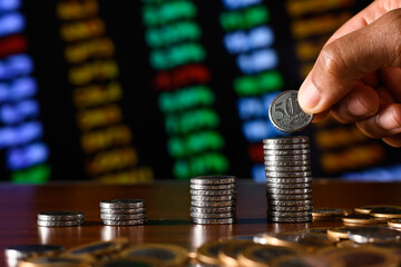  stack of currency forming a bar graph, Brazilian money on a financial graph