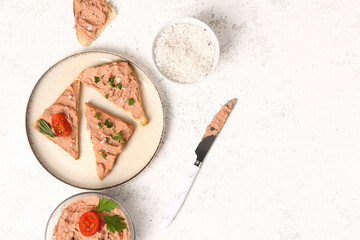 Plate of sandwiches with tasty pate and sea salt on light background - obrazy, fototapety, plakaty