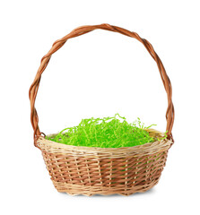 Fototapeta na wymiar Easter wicker basket with decorated grass isolated on white