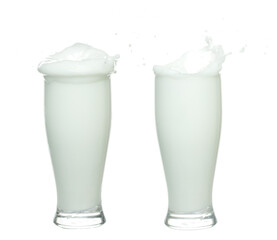 Daily Milk white lotion droplet fly splashing. Milk cream pour spill float out of tall glass. Moisturizer lotion explosion spill. White background isolated high speed shutter freeze