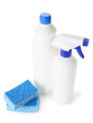 Bottles of detergent and blue cleaning sponges on white background