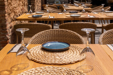 A place setting at a table in a restaurant.