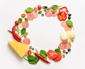 Frame made of fresh ingredients for preparing pizza on white background