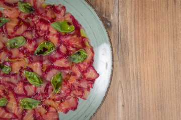 Carpaccio with salmon in sauce