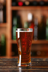 Glass of beer on table in bar. Oktoberfest celebration
