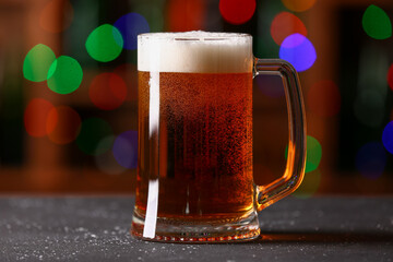 Mug of beer on table in bar. Oktoberfest celebration
