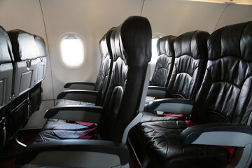 Seat inside of the plane and window space. The air line support traveler for journey to someplace....