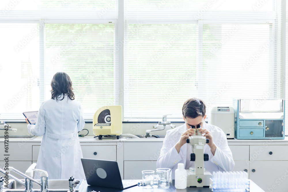 Poster multinational researcher group experimenting in the lab. research and development.