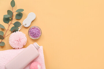 Composition with bath supplies and eucalyptus branch on color background