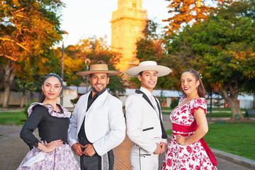 portrait of chilean folkloric group dressing  huaso costume in the city square