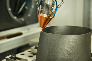 3d metal printer forms detail in production plant workshop