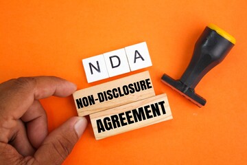 stamps and letters of the NDA alphabet and the wording of the Non-Disclosure Agreement. the concept...