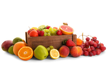 Wooden box with different fresh fruits on white background