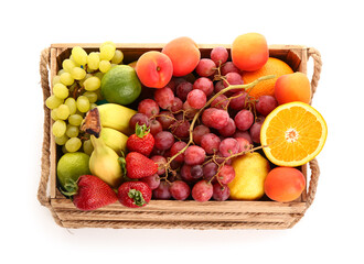 Wooden box with different fresh fruits on white background