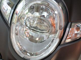 close up of modern motorbike headlight