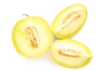 Half of sweet melon with pieces on white background