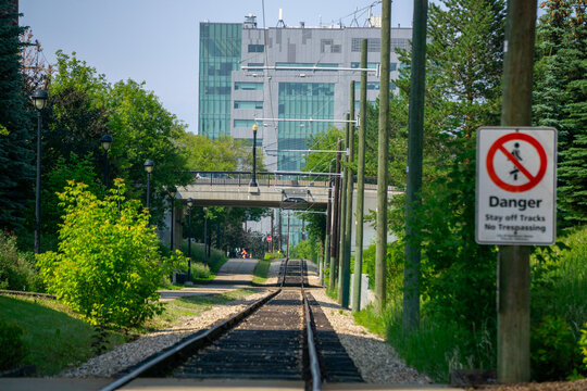 Looking down urban train tracks