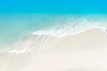 Aerial view with beach in wave of turquoise sea water shot, Top view of beautiful white sand background © SASITHORN