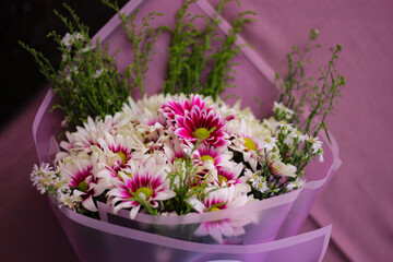 Fototapeta na wymiar Bouquet photo up close.with pink background.