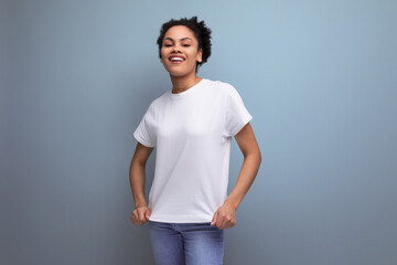 young latin brunette student woman in white t-shirt with space for id print. branding concept