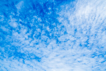 Fototapeta na wymiar clouds and blue sunny sky, white clouds over blue sky, Aerial view, nature blue sky white cleat weather.