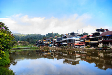 Fototapeta na wymiar Beautiful scenery of village silhouettes, rivers, mountains, lak