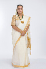Smiling south indian senior woman in sari