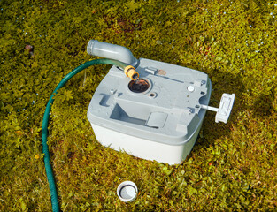 washing a portable potty