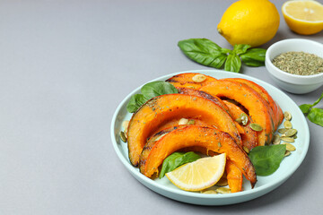 Concept of tasty homemade dish - baked pumpkin