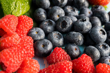 Fresh organic blueberries and raspberries. Blueberry and raspberry.Healthy eating,diet concept