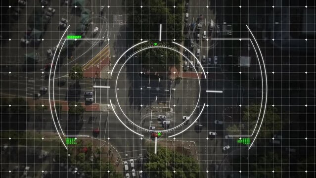 Animation of circles over grid pattern against aerial view of moving vehicles on street
