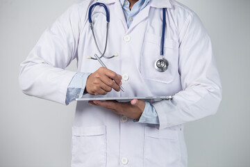 Doctor with stethoscope and digital tablet. Medical and healthcare concept.