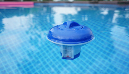 Floating pool chlorine dispenser. Float for cleaning water in swimming pool on summer.
