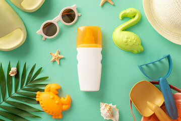 The concept of ultraviolet protection during your getaway with kids with this top view image, displaying sunscreen cream, beach toys, slippers, panama, sunglasses and palm leaf on teal backdrop